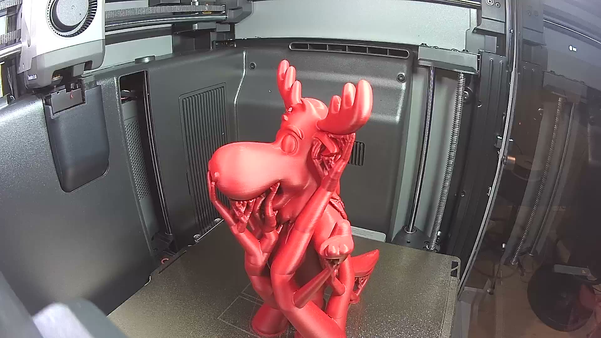 The same moose as a real 3D-printed statue on our printer